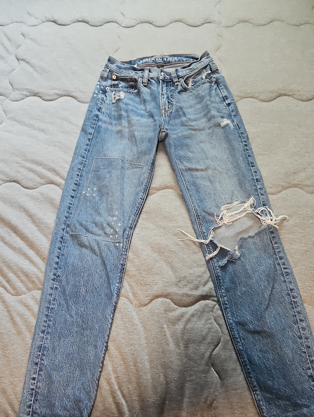 94. American Eagle Outfitters Distressed Blue Jeans